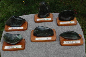 Billabong first place trophies by Drew Arnold and Oceans Art Jade. Big Sur Jade on hand carved Burmese Teak. 